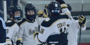 HoneyBaked players celebrate after scoring a goal.