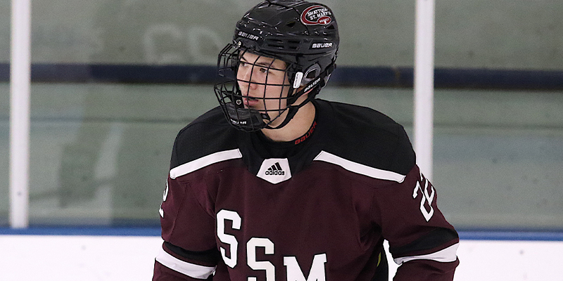 Drake Murray Looks across the ice while playing for Shattuck-St. Mary's