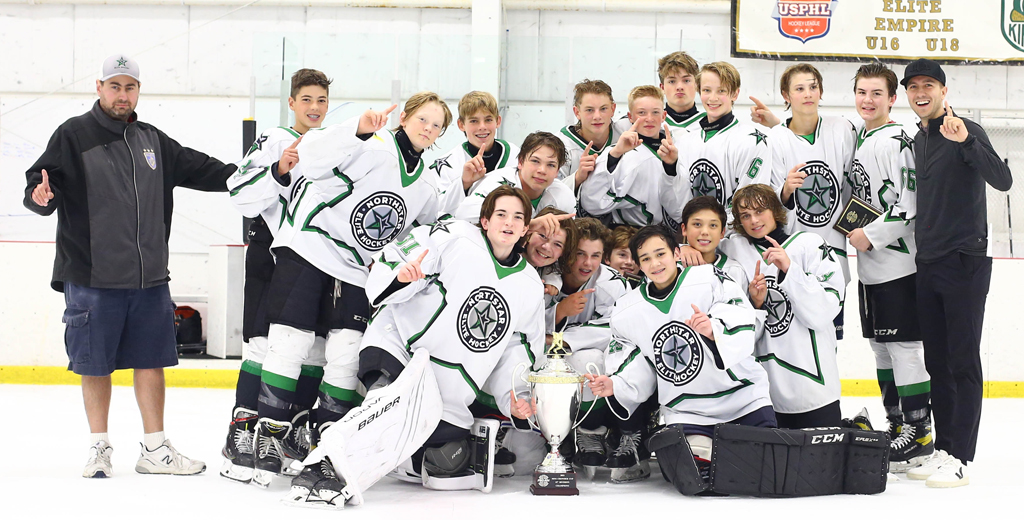 The 2007 NorthStar Elite team poses for a championship picture on the ice at the 2021 Mini-Chowder Cup.