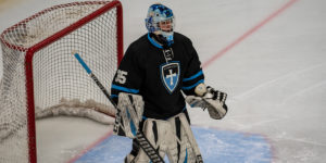 C.J. Kier stands in net during a game for the 16U NorthStar Knights hockey team.