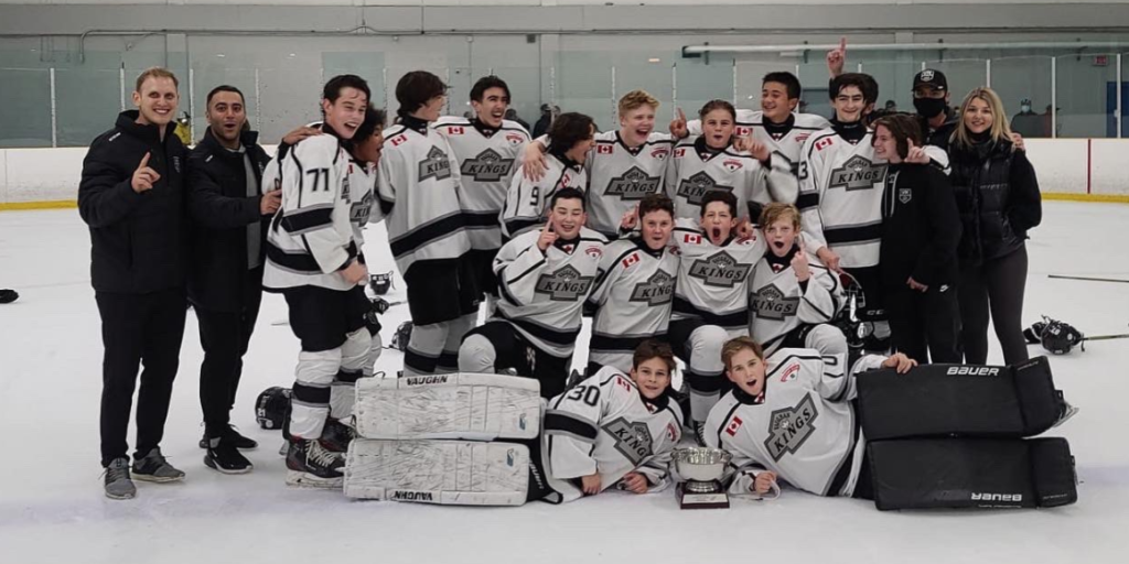 2008 Vaughan Kings hockey team poses for championship photo after winning the Toronto Jr. Red Wings Early Bird Tournament.
