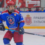 Matvei Larechnev, 2008 defenseman for Mikhailov Academy eyes the puck during a game.