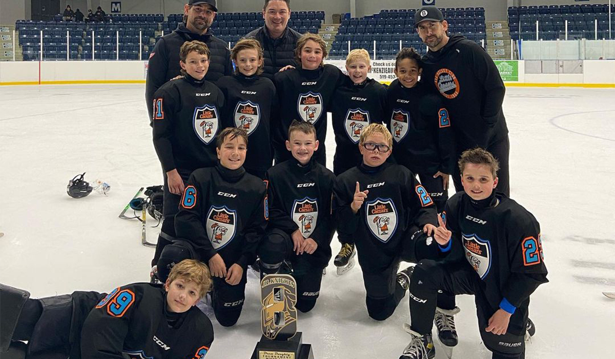 2013-born Little Caesars poses for a team photo after winning the 2022 U10 Drew Doughty Invitational