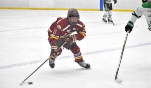 2008-born forward Cruz Pavao skates with the puck in a game at the U15 Rocky Mountain Classic for Edge School