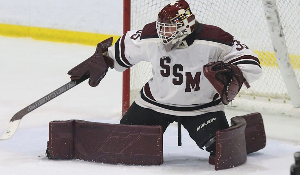 Jack Hirshorn, goaltender for 2006-born youth hockey team Shattuck-St. Mary's makes a save during a game.