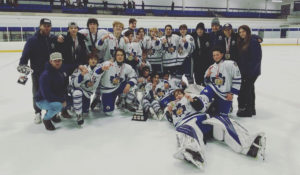The 2009-born youth hockey team Toronto Marlboros celebrate winning their division at the 2022 Vaughan Kings Classic.