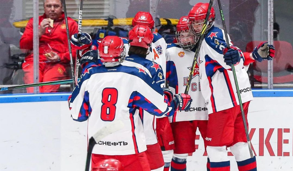 Nikita Okunev and 2006-born Russian youth hockey team CSKA Moscow celebrate a goal.