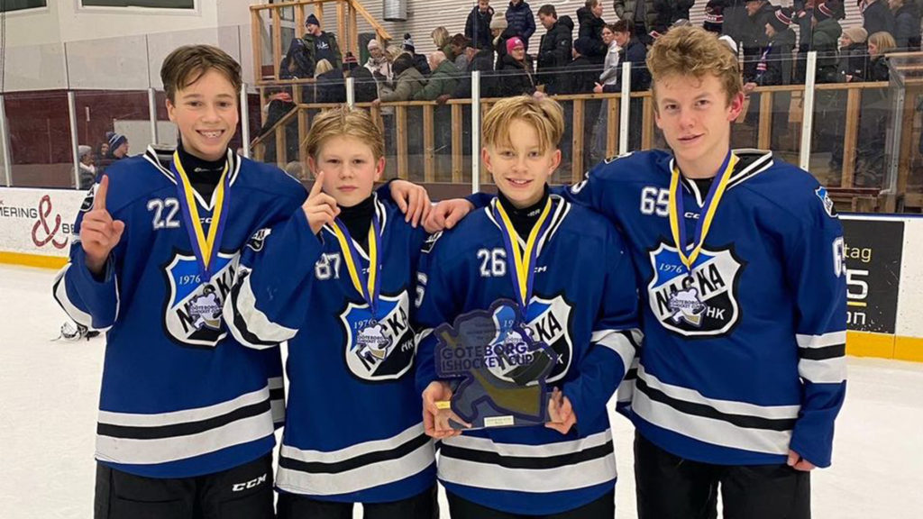 Love Lorentzon, forward for 2009-born Swedish youth hockey team Nacka HK celebrates a championship at the 2023 Göteborg Ice Hockey Cup with teammates. 