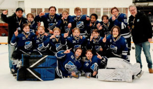 2009-born Swedish youth hockey team Nacka HK celebrates a Series A championship at the 2023 Göteborg Cup.