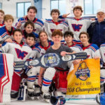 The 2008-born U.S. youth hockey team Mid-Fairfield Jr. Rangers celebrate winning their division at the Florida Exposure Cup.
