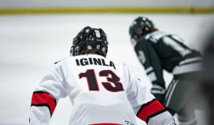 Joe Iginla, forward for 2008-born Canadian youth hockey team RINK Hockey Academy Kelowna, sets for a faceoff