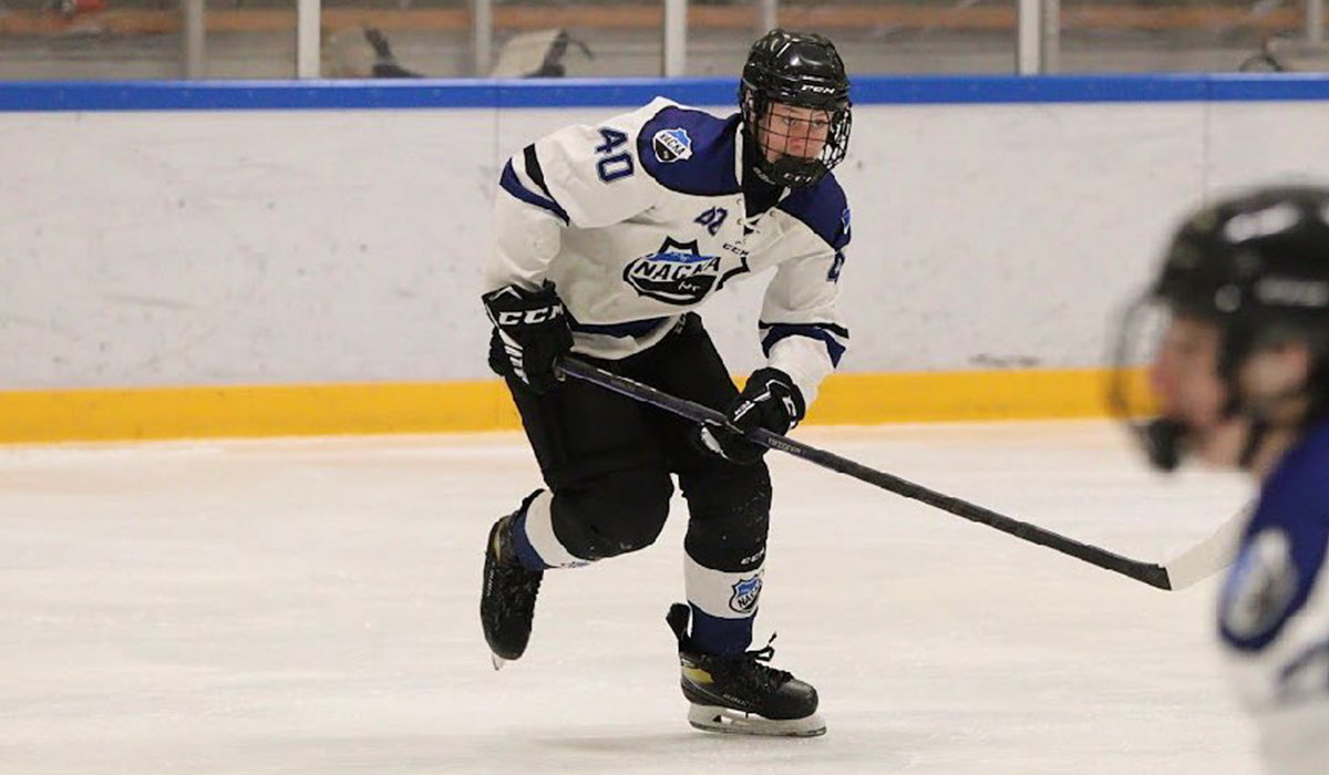 Sigge Mellbin, forward for 2008-born Swedish youth hockey team Nacka HK skates in a game.