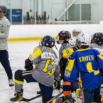 Sixty Hockey Development Camp players get on ice instruction.